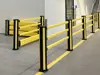 pedestrian barriers in black and yellow